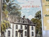 a picture of a book with a picture of a house on it