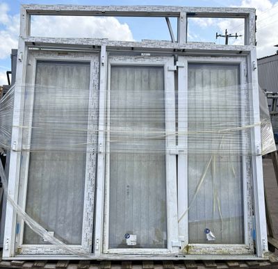 a large window that is sitting on top of a building