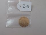 une petite pièce dans un sachet sur lequel est apposée une étiquette indiquant le prix