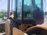 a picture of a construction vehicle parked on the side of the road