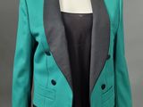 a green and black jacket on a mannequin mannequin mannequin mannequin mannequin mannequin mannequin mannequin mann