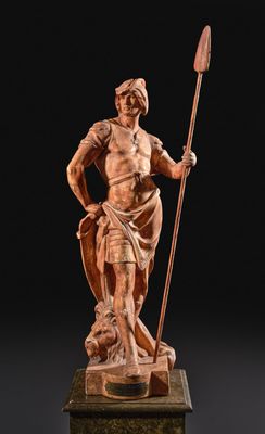 an image of a statue of a man holding a spear and shield