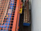 an orange crate with a bunch of eggs inside of it