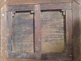 a picture of a window with a wooden frame