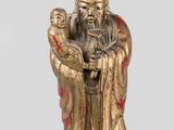 statue of a man holding a baby in his arms