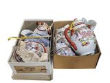 two teapots that are sitting in a box