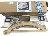 a cardboard box with a train set inside of it