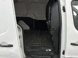 a white van with the door open and the door open