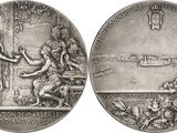 deux médailles d'argent sur lesquelles figurent les portraits d'une femme et d'un homme