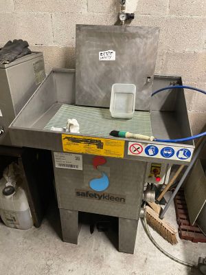 a machine that is sitting in the corner of a room