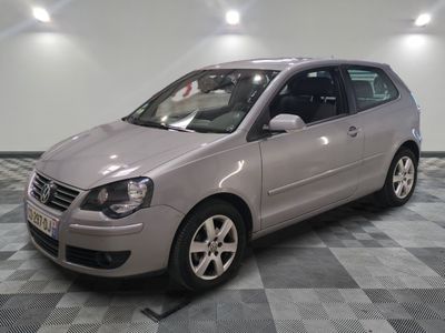 a picture of a silver car parked in a garage