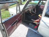a car that has a steering wheel and a seat in it