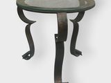 a close up of a table with a glass top on a white background