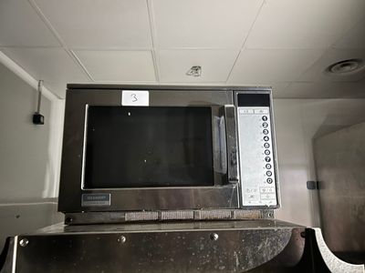 a microwave that is sitting on top of a counter