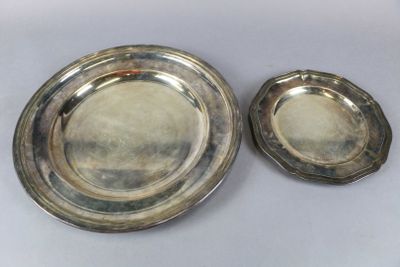 pair of silverplated serving dishes on a white background