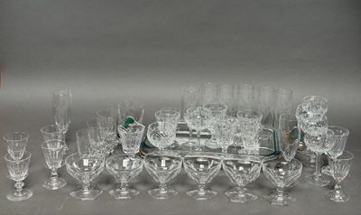 a lot of glasses and a tray on the table