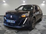 vue de face d'un SUV noir garé dans un garage