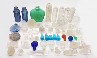 a lot of different colored glass items on the table