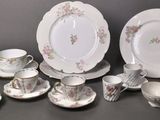 an image of a group of porcelain dishes and cups and saucers