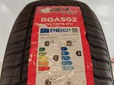 a close up of a tire on a white surface with labels on it