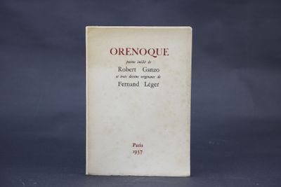 a book that is sitting on a table in front of a black background