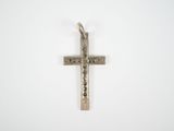sterling silver cross pendant on a white background