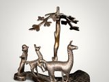 an image of a statue of a man and two animals on a boat