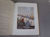 an open book with a picture of a group of people sitting at a table