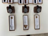 a lot of watches that are on display on the table