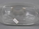 a clear glass container with a label on it