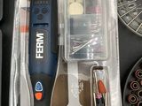 a black and blue electric tool in the package