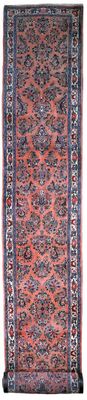 un tapis rouge et bleu avec une bordure noire sur fond blanc