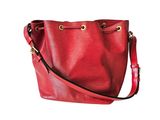 red leather handbag on white background with clipping for text
