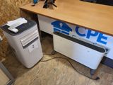a desk with a computer and a printer on top of it