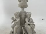 a statue that is sitting on a pedestal in the snow