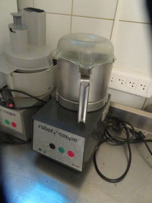 a blender and a blender sitting on a counter