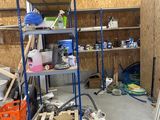 a room that has a shelf with a lot of items on it