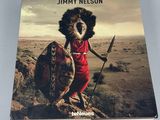 the book before they pass away by jimmy nelson is sitting on a table