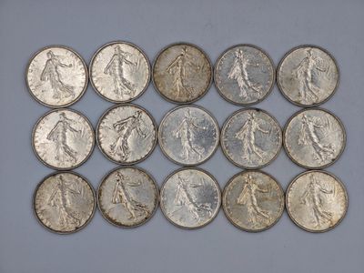 a close up of a bunch of coins sitting on top of a table