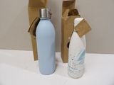 two water bottles sitting next to each other on a table