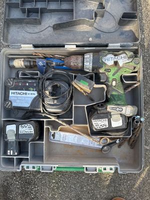 a tool kit in a plastic case on the ground