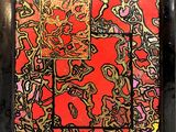 an abstract painting of a red background with a black frame