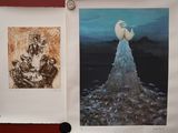 two paintings hanging on the wall next to each other