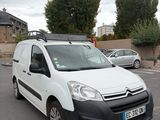 a white van that is parked in a parking lot