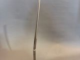 a lamp that is sitting on a table next to some wires