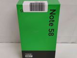 a green box with a barcode on the side of it