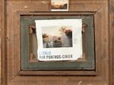 a picture of a picture hanging on a wall in a frame