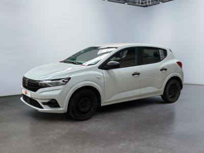 the white car is parked in a large room with white walls