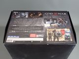 the box for the game god of war is open and ready to be played
