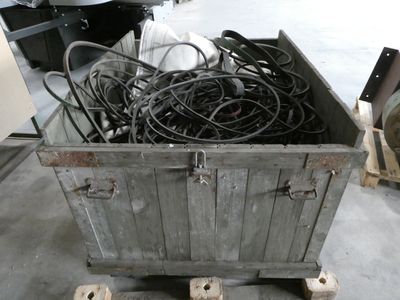 a large metal box with many wires inside of it